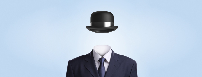 A hat and suit on a man with no face